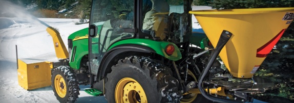 john deere plowing snow